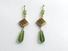 Gold tone Pewter & 14kgf Celtic Knot dangle earrings- green glass, knots, 2 1/4"