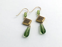 Gold tone Pewter & 14kgf Celtic Knot dangle earrings- green glass, knots, 2 1/4"