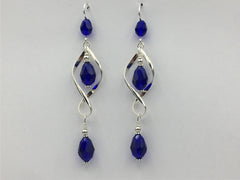 Sterling Silver long open twist drop Earrings- Celtic Knot, cobalt blue crystal