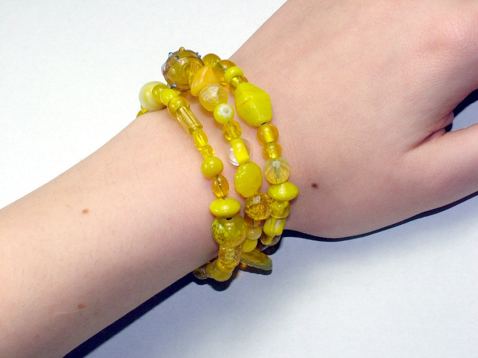 3 Strand Glass lampwork bead, crystal bead Memory Wire Bracelet, Yellows