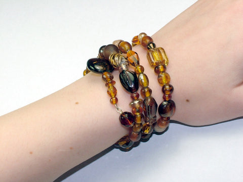 4 Strand Glass lampwork bead, crystal bead Memory Wire Bracelet, Browns