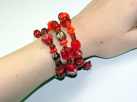 4 Strand Glass lampwork bead, crystal bead Memory Wire Bracelet, Reds