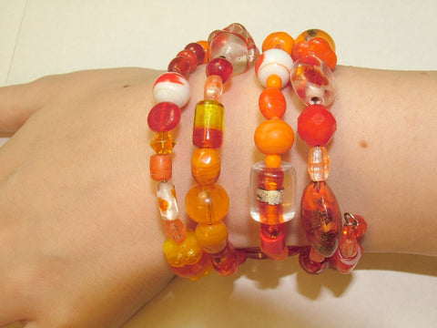 4 Strand Glass lampwork bead, crystal bead Memory Wire Bracelet, oranges