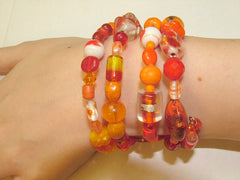 4 Strand Glass lampwork bead, crystal bead Memory Wire Bracelet, oranges