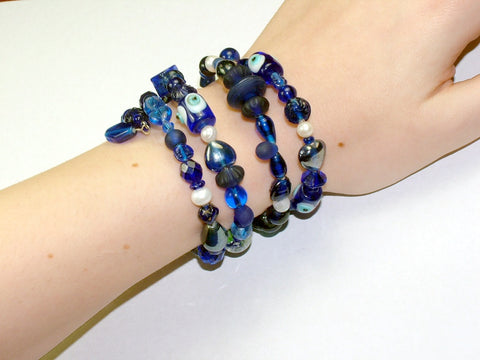 4 Strand Glass lampwork bead, crystal bead, freshwater Pearl Memory Wire Bracelet, Blues