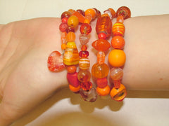 4 Strand Glass lampwork bead, crystal bead Memory Wire Bracelet, oranges