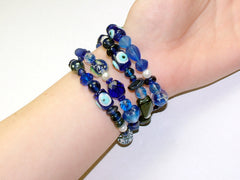 4 Strand Glass lampwork bead, crystal bead, freshwater Pearl Memory Wire Bracelet, Blues