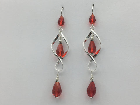 Sterling Silver long open twist drop Earrings- Celtic Knot, red orange crystal