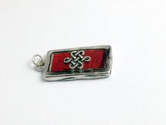 Pewter frame, red spiral holographic paper, pewter Celtic knot pendant-resin