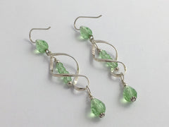 Sterling Silver long open twist drop Earrings- Celtic Knot, light green crystal